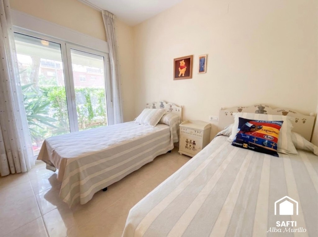 Exclusiva planta baja con jardín privado y piscina comunitar - foto 25
