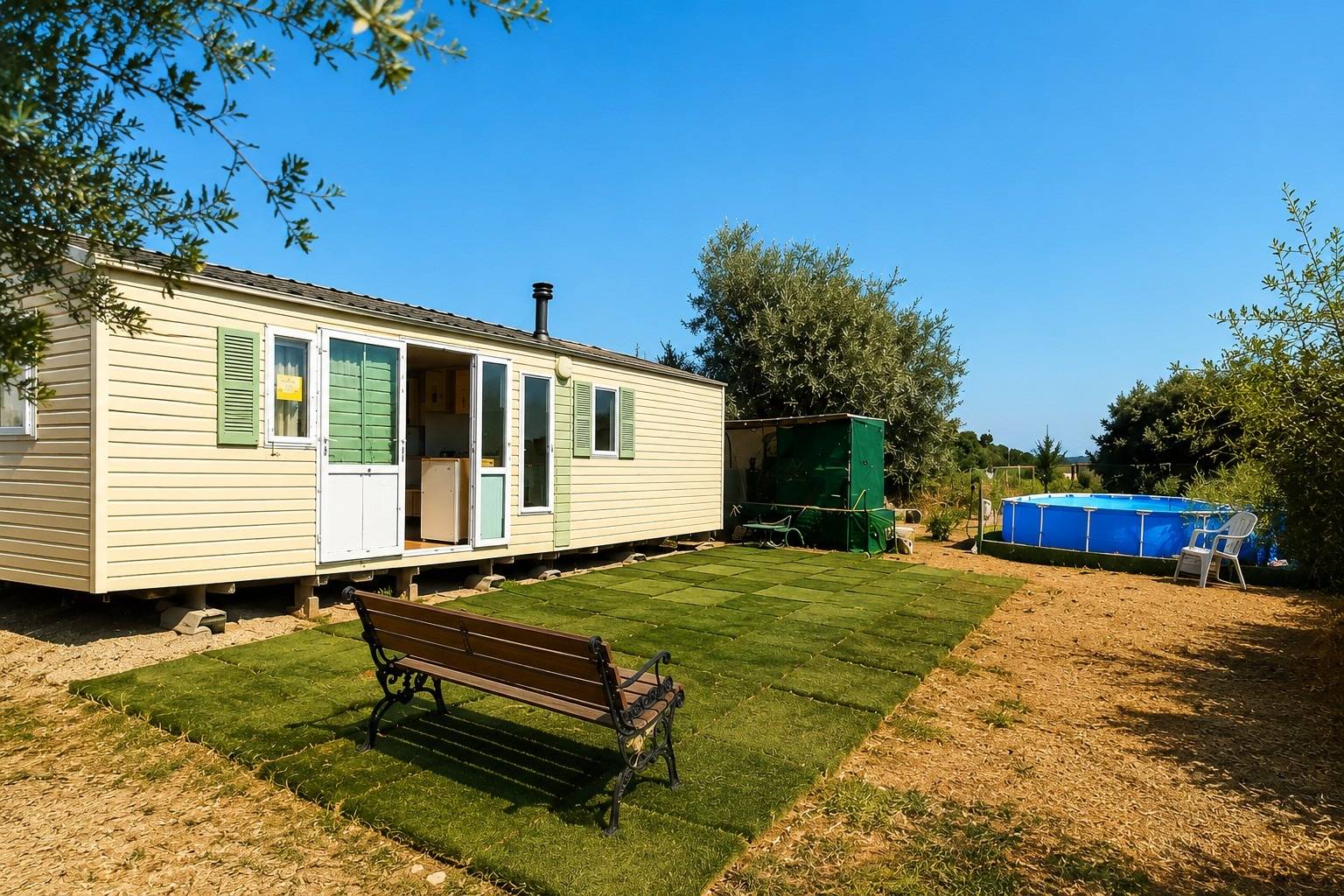 PARCELA RÚSTICA DE 500 m2 CON MOBILE HOME Y PISCINA EN DOS HERMANAS